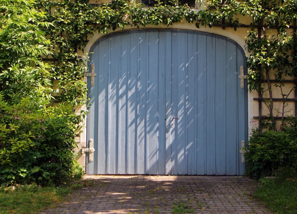 blue wooden garage door replacement tallahassee